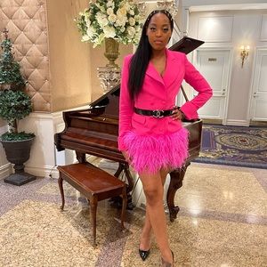 Pink blazer dress with fathered hemline